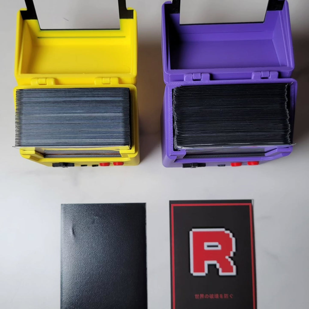 Yellow and purple deck boxes open with removable display panels shown in front.