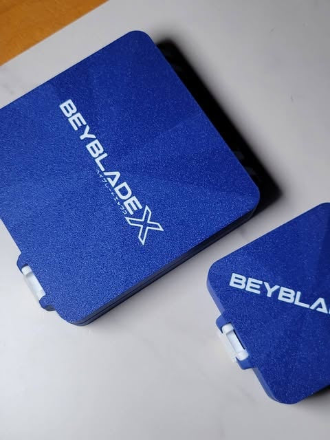 Comparison of the textured lids on the large and original Bit Boxes.