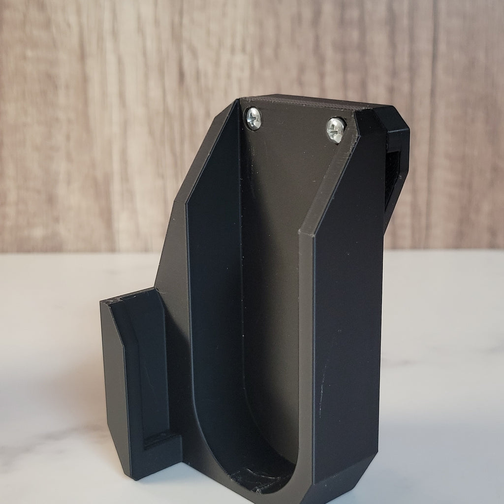 Black Ruzz3D launcher holster showing its shaped side profile.