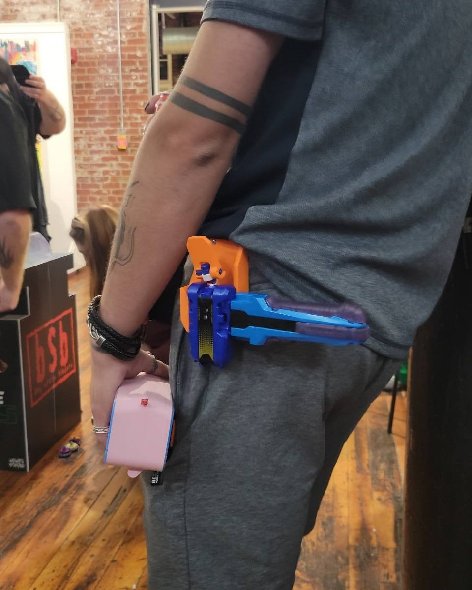 Ruzz3D accessories carried at the waist during a tournament.