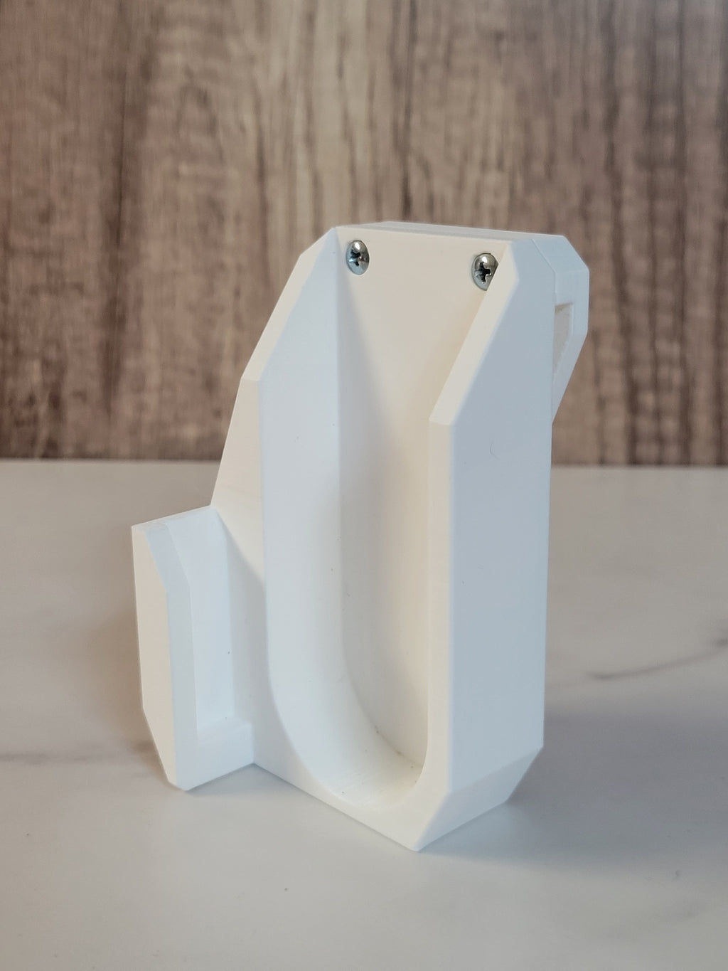 Side profile of a white printed launcher holster.