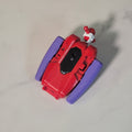 Red Beyblade X string launcher fitted into a purple Ruzz3D grip.
