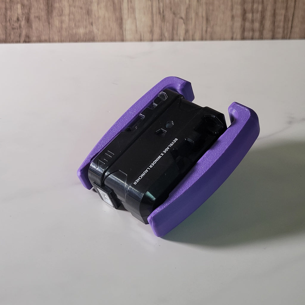 Purple Beyblade X winder launcher grip shown fitted around a launcher.