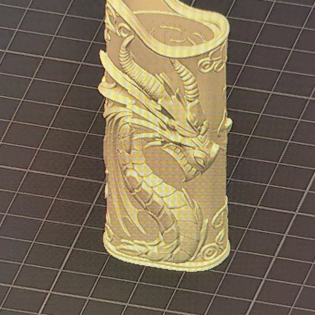 Gold-colored textured lighter-cover design shown on a printer build plate.