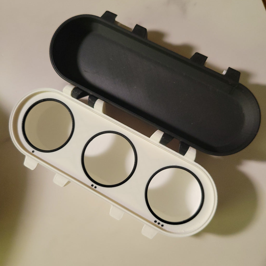 Open three-position Beyblade X deck box showing its interior tray.
