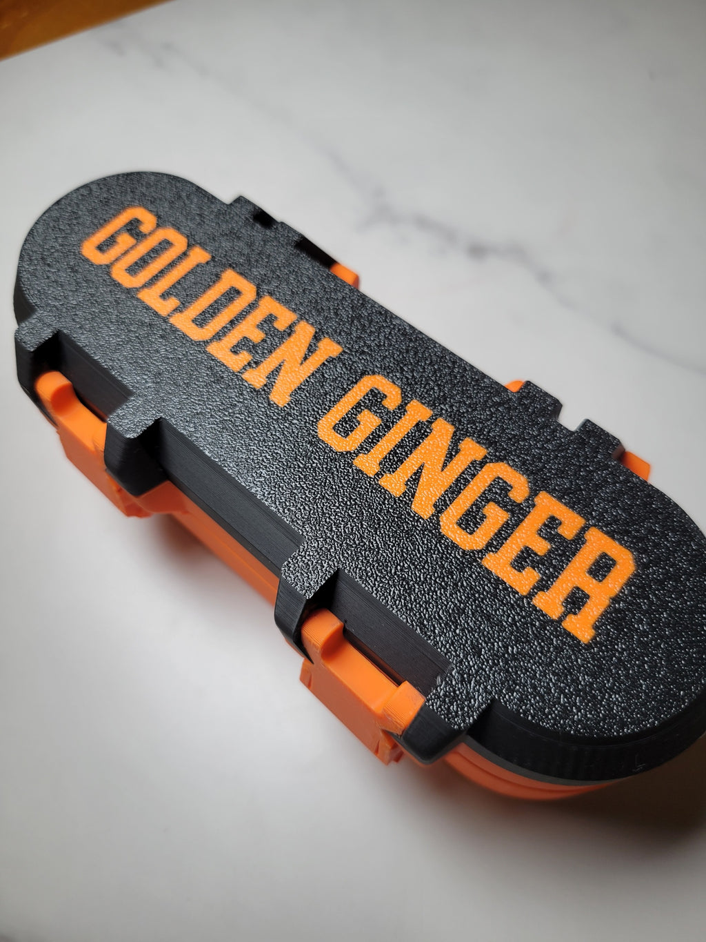 Golden Ginger personalized Beyblade deck box in black and orange