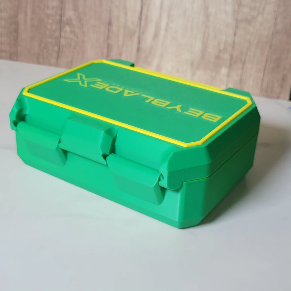 Closed green Ratchet Box showing its front locking latch.