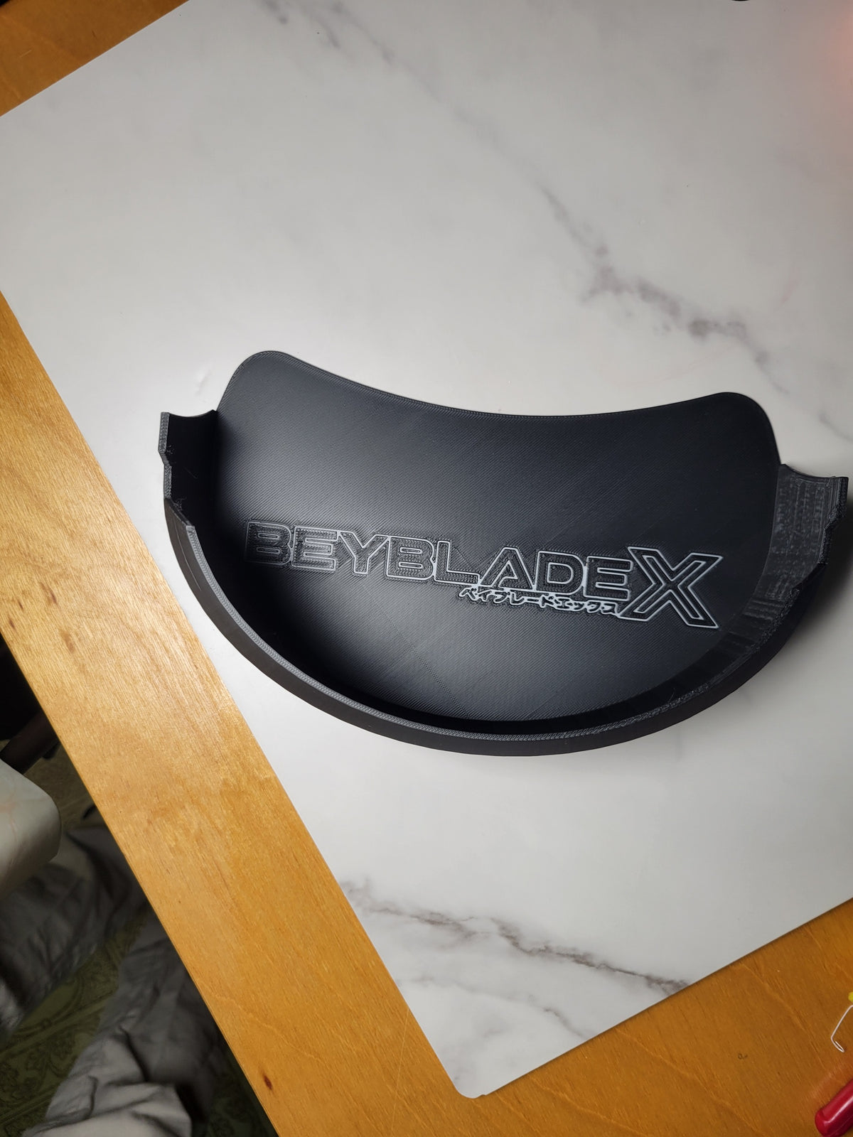 The black Xtreme Pocket catch tray shown on its own.
