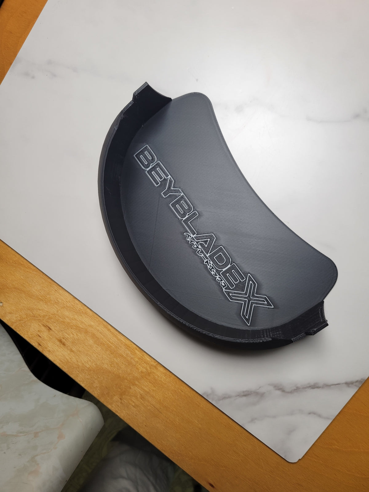 Angled view of the black Xtreme Pocket tray.